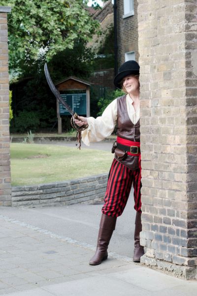 Pirate in costume with sword